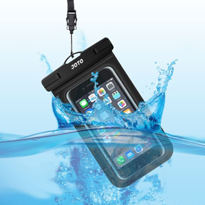 A mobile phone in a waterproof protective pouch is captured dipping into the water