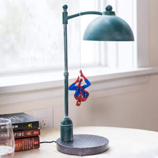 Spider Man Desk Lamp is a lamp where Spider Man is hung down from the street lamp upside down and looks pretty elegant as a desk lamp