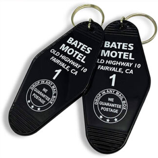 On black key tags there is written with white text "Bates Motel" and under it there is written the address of Bates Motel from the iconic Alfred Hitchcock movie Psycho and number of room number 1.