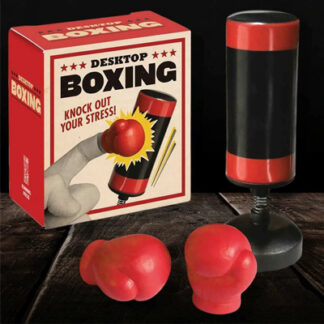A mini desktop boxing kit is displayed with its mini punching bag and two tiny red boxing glows fitting to a finger. It's a great stress relief tool for office which you can set on your desktop and punch with your fingers anytime you feel bored.