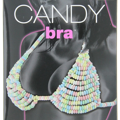 An edible candy bra is displayed on a woman. Woman wears an edible candy bra made out of tiny donut candies connected with a tiny thread passed through.