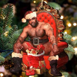 Barry Wood is figured into a Christmas tree ornament with Santa hat, boots worn and presents in front of him